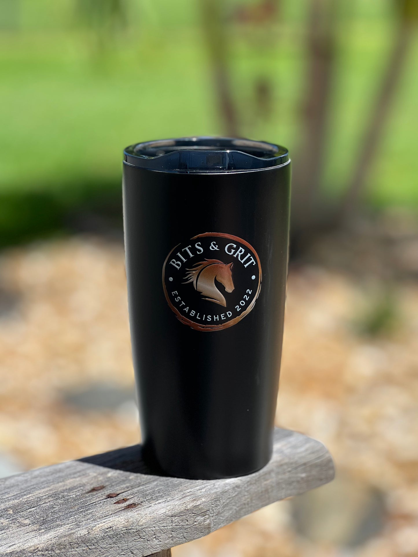 The Bits & Grit™️ Tumbler is a must-have for anyone who wants to enjoy their favorite hot or cold beverage on-the-go. Featuring a 20 oz capacity and double insulation, this BPA-free tumbler can keep drinks hot or cold for up to 6 hours. Plus, its slide action lid and rubber bottom ensure a secure and convenient drinking experience.